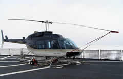 helicopter on helo pad deck of Healy.